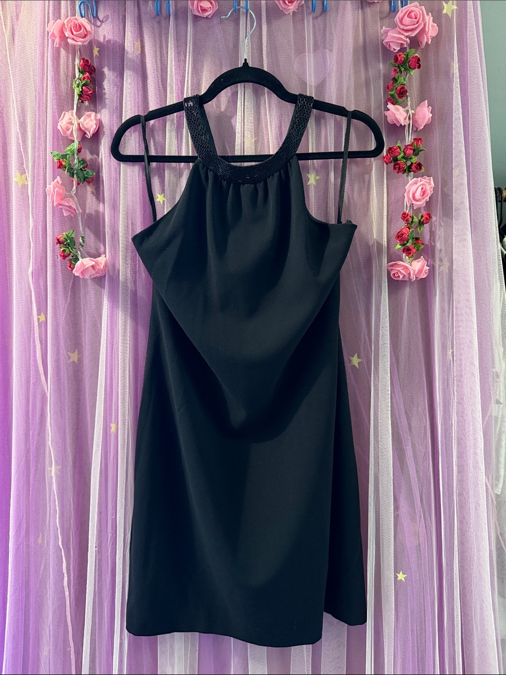 Woman’s beaded silk trim party dress